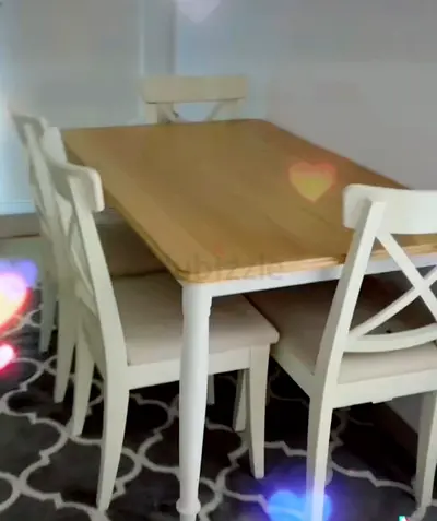 Stylish Dining Table with Four Chairs