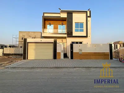 Modern villa for rent in Al Yasmin. Features include: a front parking area, a spacious courtyard, and parking