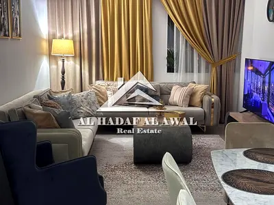 For monthly rent Two bedrooms and a living room in Al Taawun area with free parking and internet