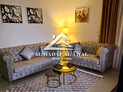 For monthly rent - Luxury apartment, occupant one bedroom and a hall in al taawun