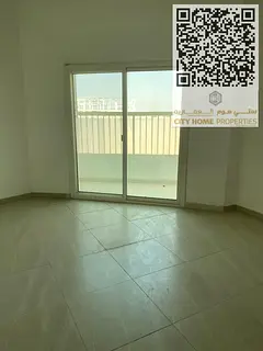 Spacious 2-bedroom apartment with a living room in a family-friendly building in Al Zahia. Located i