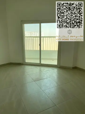 شقه غرفتين وصاله مساحه كبيره مبني عائلي بالزاهيه سكن راقي لايجار السنوي بالقرب من شارع محمد بن زايد