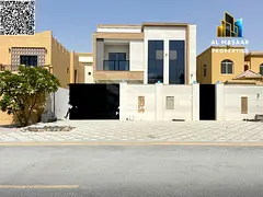 Villa in Al Muwaihat, large area, freehold ownership, includes air conditioning, electricity, and wa