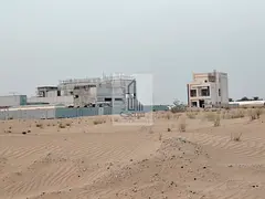 Residential lands for sale in Sharjah, Basateen Al Zubair area, Al Rahmaniyah suburb, installment sy
