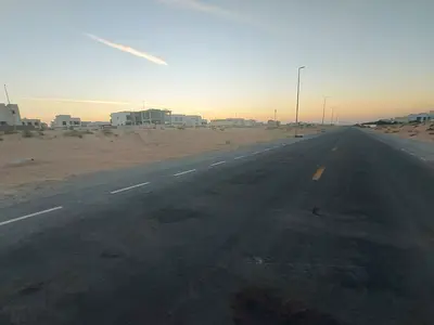 للبيع قطعة أرض تجارية بإمارة الشارقة - منطقة روضة القرط - ضاحية الرويضات