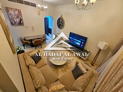 For monthly rent in Al Majaz 3, one bedroom and a hall with free internet