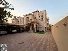 A beautiful, fully maintained villa with a distinctive stone facade.
