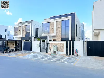 Luxury villa with a swimming pool and excellent finishes in the Al Yasmin area, directly next to Al Hamidiya Park - freehold ownership for all nationa