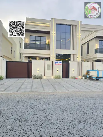 A luxurious villa located in the Al-Haliou area, comprising a ground floor and two upper floors, boasts a prime location and a modern design that prio