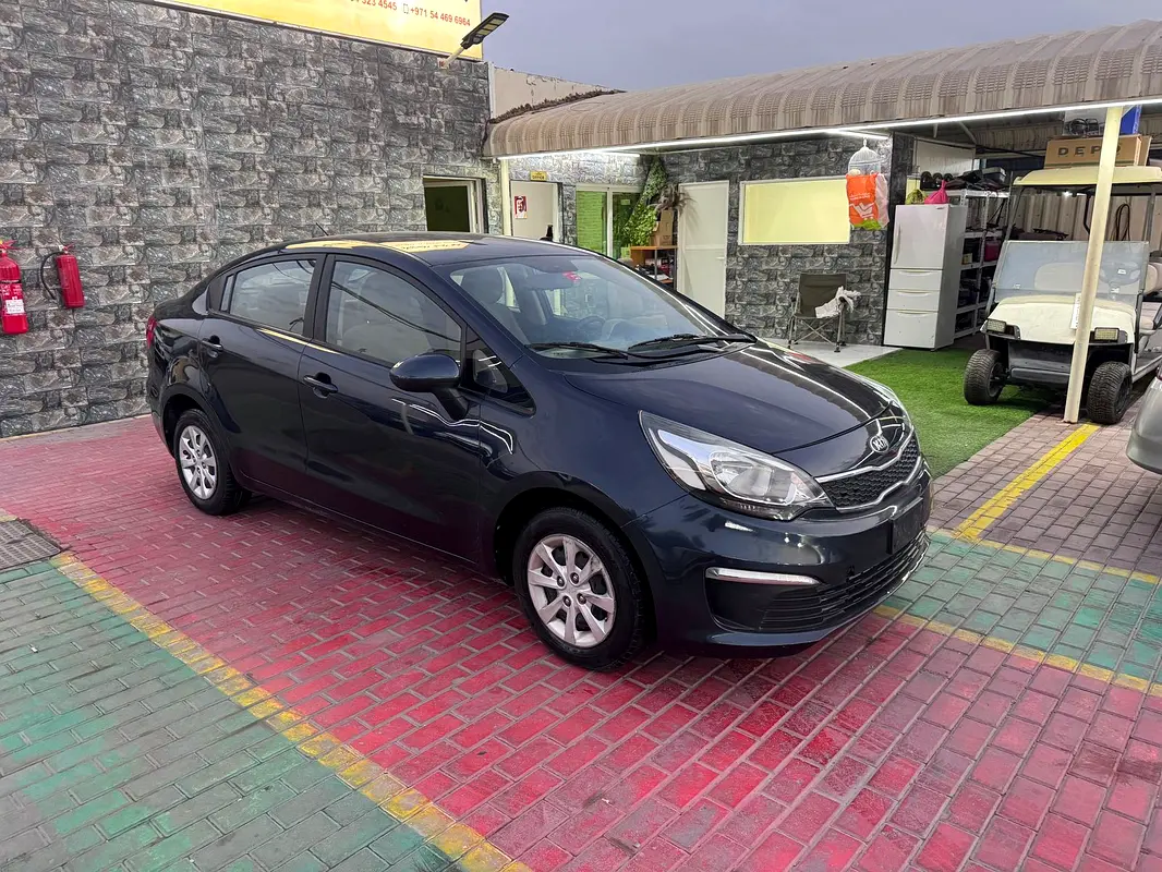 Kia Rio 2016 — photo 1 of 14