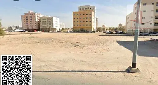 For sale in Ajman, residential/commercial land in Al Rashidiya 3, area 6383 sq ft, G+5, corner plot on street and alley, asking price 1,800,000