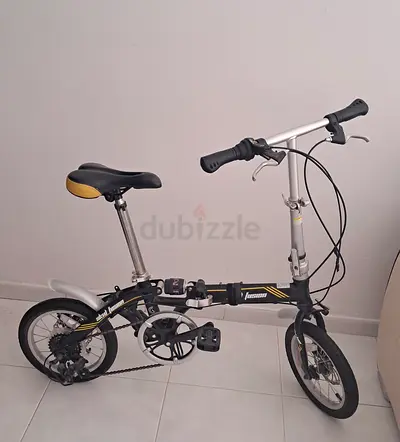 Skid fusion foldable bicycle with 6 gears transmission At discount