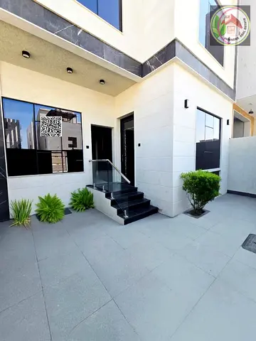 Beautiful stone villa for sale at an attractive price, freehold ownership, on Sheikh Mohammed Bin Zayed Road