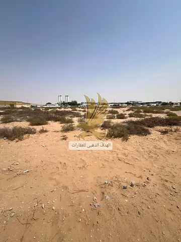 Commercial land for sale in Emirates Industrial City, suitable for showrooms. First plot directlynership: on Emirates Bypass Road, excellent locatio