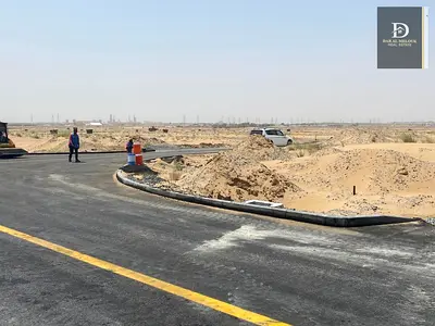 For sale in Sharjah Maziraa area A residential and investment plot of land with an area of ​​3,121 feet A very special location, on the corner of t