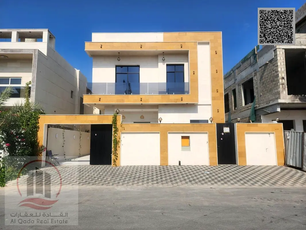 Villa for sale in Ajman, Al Yasmin area. 5 master bedrooms, majlis, 2 living rooms, and a maid's room. Freehold ownership for all nationalities. Bank