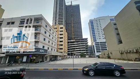 golden opportunity to buy land for building highly income. Prime location opposite Sharjah city center on the Highway road Commercial plot for sale.