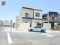 Corner villa at an affordable price, including air conditioning, in one of Ajman's most prestigi
