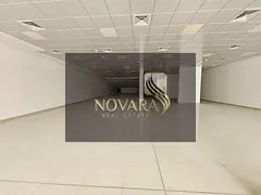 A spacious 13,000 square foot retail space is available, located directly on a main street in a vibr