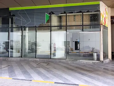 COMMIERCIAL SPACE AVAILABLE FOR RENT GOOD FOR GYM,NURSURY,MEDICAL CENTER,SALOON,S R MARKET BEHINDE EXPO CENTER ON AL MMZAR CORNICHE NEAR AL TAWUN AREA
