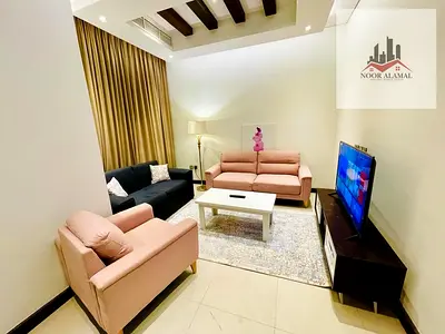 Sharjah -alriffa-alheera beach - one bedroom apartment with a living room, kitchen, and bathroom