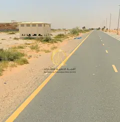 For sale: industrial land in Al-Sajaa, area 13,616 sq ft, prime location, corner plot on two streets