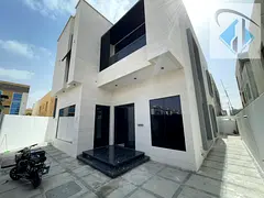 Villa for sale in Ajman, Al Yasmin area. 6 master bedrooms, majlis, 2 living rooms, maid's room,