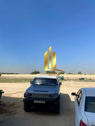 For sale: Residential-commercial land in Muwaileh Commercial, next to the park directly.