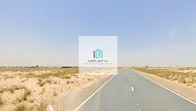 Residential Plot in Basateen Al Zubair, Sharjah - Located on a main road with a service lane (sikka)