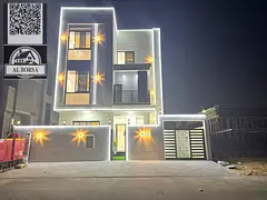 Villa for sale in Al Zahia, Ajman. 6 master bedrooms, living room, majlis, spacious kitchen, and mai