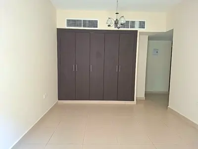 Like brand new building Muwaileh Commercial sharja 1bhk with balcony 2 washroom with master room with waldrop no deposit 6chq possible