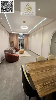 The most beautiful and elegant apartments in Ajman! A two-bedroom apartment with a living room, bran