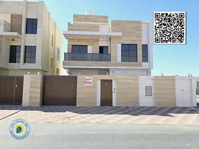 For sale in Al Bahia, Ajman, a modern villa with 5 rooms and a roof. The price includes registration and ownership fees.