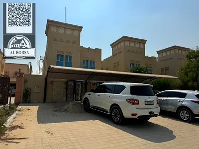 Villa for rent in Ajman Al Muwaihat 2 on the corner of two streets, beautiful location, payment facilities