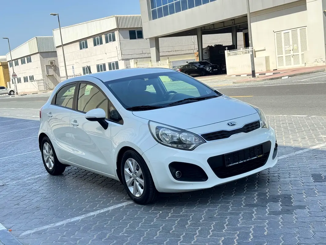 Kia Rio 2014 — photo 1 of 13
