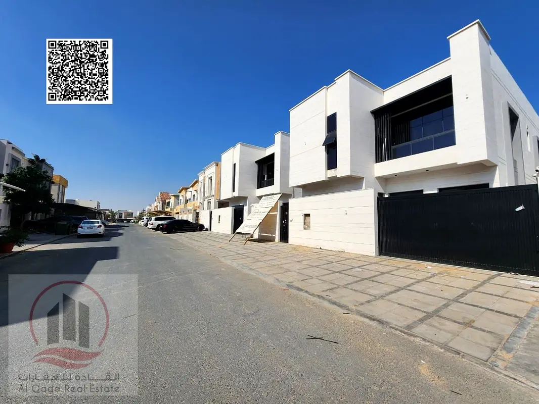 Villa for sale in Al Yasmeen area, Ajman. Modern design, ground floor, first floor, and roof (5 master bedrooms, majlis, living room, and maid's room)