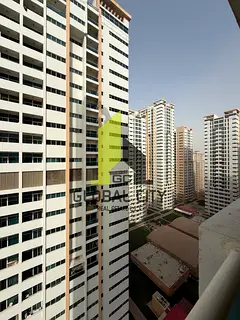 available 2bhk for sale in ajman one empty apartment close kitchen with parking