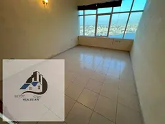 For Rent in Ajman – Al Rashidiya 1 Horizon Towers A spacious 2-bedroom apartment with a living roo