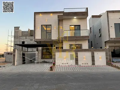 A villa with a price including registration and ownership fees on the main street, ready for occupancy in the most upscale areas of Ajman, freehold fo