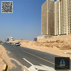 🏙️ Commercial + Residential Plot for Sale in Al Amra, Ajman (Near McDonald’s – Main Road)
