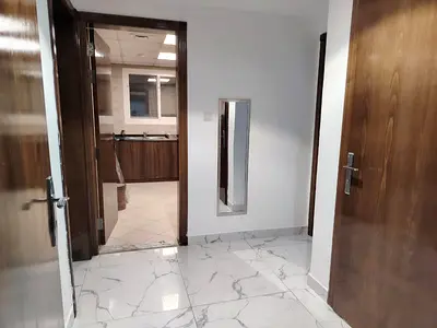 Furnished one-bedroom apartment for monthly rent in Al Rashidiya Ajman, Al Waha Towers, creek view, spacious, utilities included
