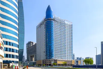 مؤجرة حتى 31/01/2027 | إطلالة قناة ومسبح | 1 غرفة نوم | برج AG