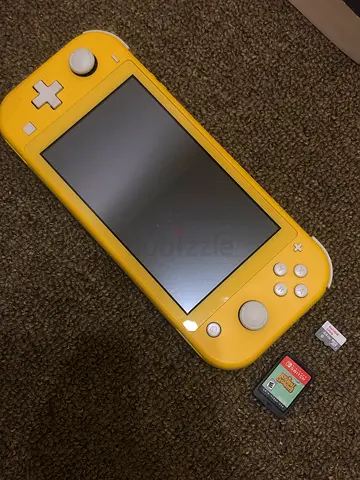 Nintendo Switch Lite - Yellow with Game Card and 64 gb sd minor scratches