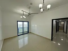 Two-bedroom apartment with a separate living room in Al Nuaimiya 1, on Al Ittihad Road, next to Emir