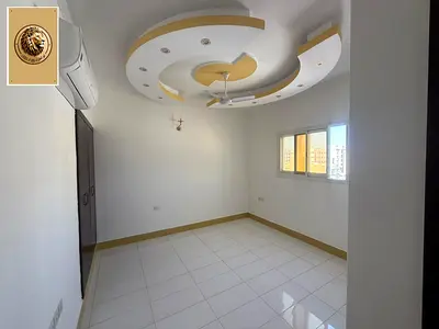 For annual rent in Al Jurf 2 area: Two bedrooms, a living room, and three bathrooms. Very