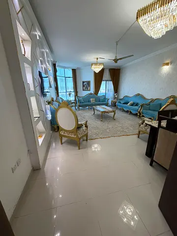3 bedrooms and a living room with a full sea view