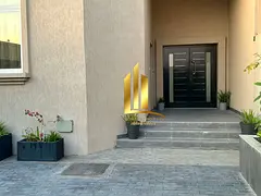 Adjacent flats for sale in Al-Hoshi, Al-Badiya neighborhood, Sharjah.