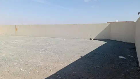 Ready-to-Use Industrial Yard for Sale in Al Saja’a Industrial Area – Strategic Location in the Scrap Yards & Auctions Zone