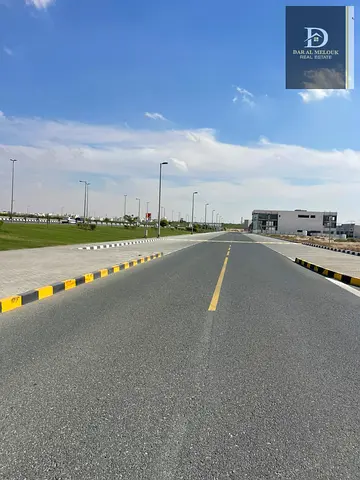 For Sale in Sharjah Industrial Area 18 Commercial Land for Warehouses Area: 26,726 sq ft Corner plot on two streets Building permit for showrooms