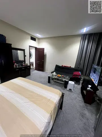 One-bedroom apartment for sale in Al Khor Towers Ajman, 940 sqft, open view to Clock Tower, furnished and ready.